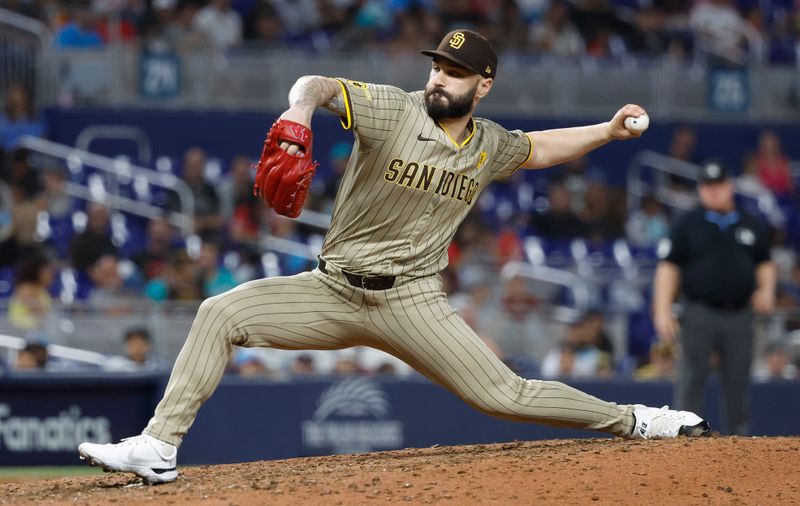 Aug 9, 2024; Miami, Florida, USA;  San Diego Padres relief pitcher Tanner Scott (66) pitches in the tenth inning at loanDepot Park. Mandatory Credit: Rhona Wise-USA TODAY Sports