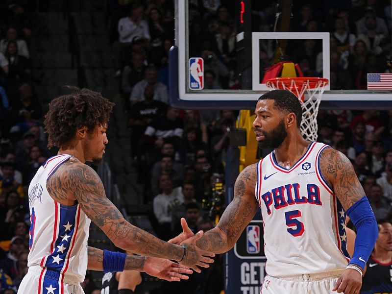 DENVER, CO - JANUARY 27: Marcus Morris Sr. #5 and Kelly Oubre Jr. #9 of the Philadelphia 76ers high five during the game against the Denver Nuggets on January 27, 2024 at the Ball Arena in Denver, Colorado. NOTE TO USER: User expressly acknowledges and agrees that, by downloading and/or using this Photograph, user is consenting to the terms and conditions of the Getty Images License Agreement. Mandatory Copyright Notice: Copyright 2024 NBAE (Photo by Bart Young/NBAE via Getty Images)