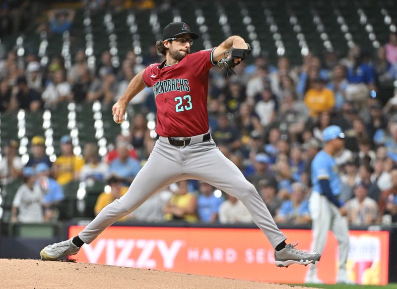 Sep 20, 2024; Milwaukee, Wisconsin, USA; Arizona Diamondbacks pitcher Zac Gallen (23) delivers a pitch against the Milwaukee Brewers in the first inning  at American Family Field. Mandatory Credit: Michael McLoone-Imagn Images