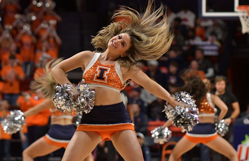 Jan 13, 2023; Champaign, Illinois, USA;  Members too the Illinois Fighting Illini dance team performs during the second half against the Michigan State Spartans  at State Farm Center. Mandatory Credit: Ron Johnson-USA TODAY Sports