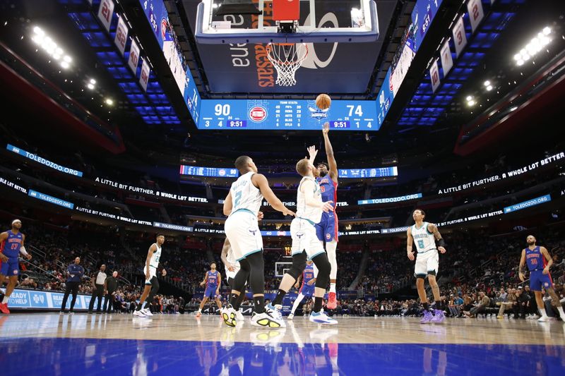 DETROIT, MI - March 11: James Wiseman #13 of the Detroit Pistons drives to the basket during the game against the Charlotte Hornets on March 11, 2024 at Little Caesars Arena in Detroit, Michigan. NOTE TO USER: User expressly acknowledges and agrees that, by downloading and/or using this photograph, User is consenting to the terms and conditions of the Getty Images License Agreement. Mandatory Copyright Notice: Copyright 2024 NBAE (Photo by Brian Sevald/NBAE via Getty Images)