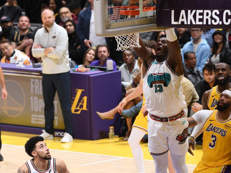 LOS ANGELES, CA - NOVEMBER 13: Jaren Jackson Jr. #13 of the Memphis Grizzlies dunks the ball during the game against the Los Angeles Lakers on November 13, 2024 at Crypto.Com Arena in Los Angeles, California. NOTE TO USER: User expressly acknowledges and agrees that, by downloading and/or using this Photograph, user is consenting to the terms and conditions of the Getty Images License Agreement. Mandatory Copyright Notice: Copyright 2024 NBAE (Photo by Adam Pantozzi/NBAE via Getty Images)