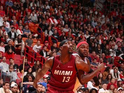 MIAMI, FL - DECEMBER 25:  Bam Adebayo #13 of the Miami Heat boxes out during the game  on December 25, 2023 at Kaseya Center Arena in Miami, Florida. NOTE TO USER: User expressly acknowledges and agrees that, by downloading and or using this Photograph, user is consenting to the terms and conditions of the Getty Images License Agreement. Mandatory Copyright Notice: Copyright 2023 NBAE (Photo by Issac Baldizon/NBAE via Getty Images)