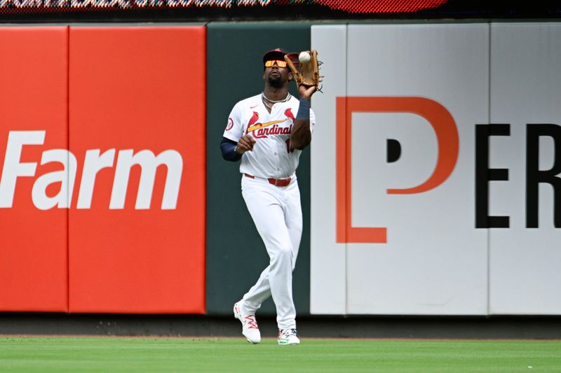 Aug 18, 2024; St. Louis, Missouri, USA; St. Louis Cardinals right fielder Jordan Walker (18) catches a fly ball hit by the Los Angeles Dodgers in the first inning at Busch Stadium. Mandatory Credit: Joe Puetz-USA TODAY Sports