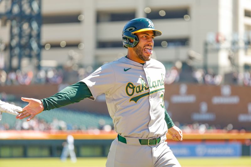 Apr 7, 2024; Detroit, Michigan, USA; Oakland Athletics third baseman Abraham Toro (31) celebrates as he scores a run during the first inning of the game against the Detroit Tigers at Comerica Park. Mandatory Credit: Brian Bradshaw Sevald-USA TODAY Sports