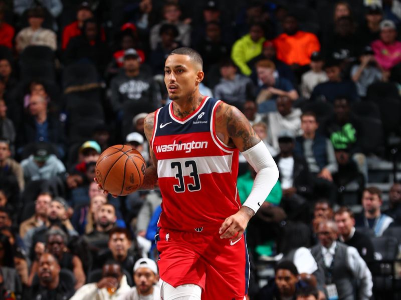 BROOKLYN, NY - OCTOBER 14: Kyle Kuzma #33 of the Washington Wizards dribbles the ball during the game against the Brooklyn Nets during a NBA preseason game on October 14, 2024 at Barclays Center in Brooklyn, New York. NOTE TO USER: User expressly acknowledges and agrees that, by downloading and or using this Photograph, user is consenting to the terms and conditions of the Getty Images License Agreement. Mandatory Copyright Notice: Copyright 2024 NBAE (Photo by David L. Nemec/NBAE via Getty Images)