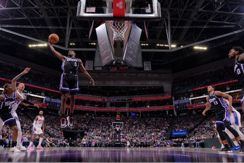 SACRAMENTO, CA - MARCH 25:  De'Aaron Fox #5 of the Sacramento Kings grabs the rebound during the game on March 25, 2024 at Golden 1 Center in Sacramento, California. NOTE TO USER: User expressly acknowledges and agrees that, by downloading and or using this Photograph, user is consenting to the terms and conditions of the Getty Images License Agreement. Mandatory Copyright Notice: Copyright 2024 NBAE (Photo by Rocky Widner/NBAE via Getty Images)