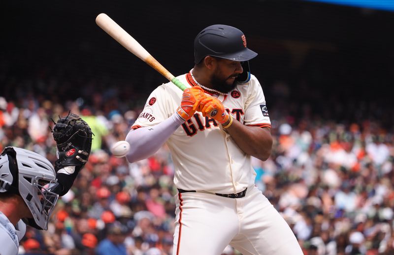 Aug 11, 2024; San Francisco, California, USA; San Francisco Giants designated hitter Jerar Encarnacion (59) avoids the high pitch for a walk against the Detroit Tigers during the second inning at Oracle Park. Mandatory Credit: Kelley L Cox-USA TODAY Sports