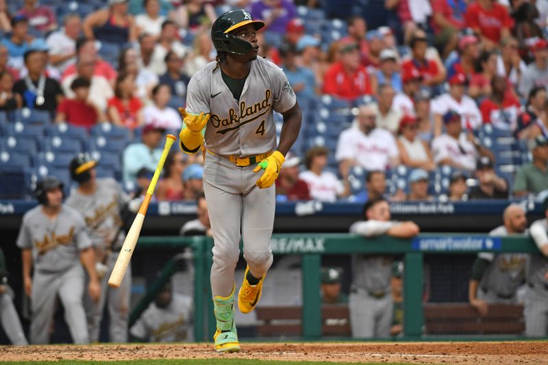 Jul 14, 2024; Philadelphia, Pennsylvania, USA; Oakland Athletics outfielder Lawrence Butler (4) watches his third home run of the game against the Philadelphia Phillies during the seventh inning at Citizens Bank Park. Mandatory Credit: Eric Hartline-USA TODAY Sports