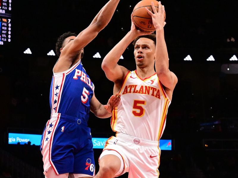 ATLANTA, GA - MARCH 10: Dyson Daniels #5 of the Atlanta Hawks shoots the ball during the game against the Philadelphia 76ers on March 10, 2025 at State Farm Arena in Atlanta, Georgia.  NOTE TO USER: User expressly acknowledges and agrees that, by downloading and/or using this Photograph, user is consenting to the terms and conditions of the Getty Images License Agreement. Mandatory Copyright Notice: Copyright 2025 NBAE(Photo by Adam Hagy/NBAE via Getty Images)