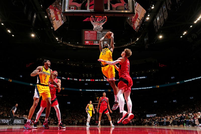 TORONTO, CANADA - FEBRUARY 14: Isaiah Jackson #22 of the Indiana Pacers dunks the ball during the game against the Toronto Raptors on February 14, 2024 at the Scotiabank Arena in Toronto, Ontario, Canada.  NOTE TO USER: User expressly acknowledges and agrees that, by downloading and or using this Photograph, user is consenting to the terms and conditions of the Getty Images License Agreement.  Mandatory Copyright Notice: Copyright 2024 NBAE (Photo by Mark Blinch/NBAE via Getty Images)