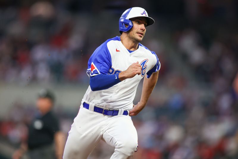 May 6, 2023; Atlanta, Georgia, USA; Atlanta Braves first baseman Matt Olson (28) runs to third against the Baltimore Orioles in the fourth inning at Truist Park. Mandatory Credit: Brett Davis-USA TODAY Sports
