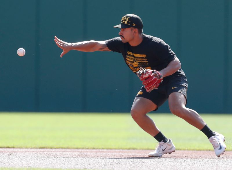 Aug 28, 2024; Pittsburgh, Pennsylvania, USA;  Pittsburgh Pirates second baseman Nick Gonzalez (39) takes infield practice before a game against the Chicago Cubs at PNC Park. Mandatory Credit: Charles LeClaire-USA TODAY Sports