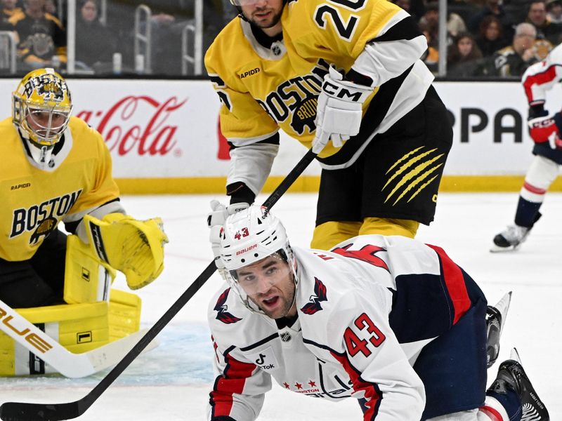 Mar 7, 2026; Boston, Massachusetts, USA; Washington Capitals right wing Tom Wilson (43) reaches for the puck during the second period of a game against the Boston Bruins at the TD Garden. Mandatory Credit: Brian Fluharty-Imagn Images