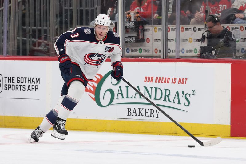 Dec 1, 2025; Newark, New Jersey, USA; Columbus Blue Jackets center Charlie Coyle (3) skates with the puck against the New Jersey Devils during the third period at Prudential Center. Mandatory Credit: Ed Mulholland-Imagn Images