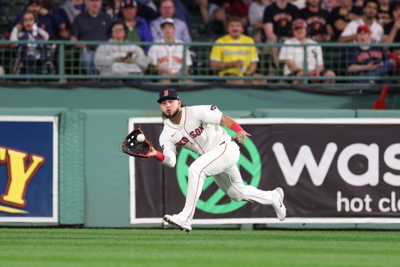 Sep 10, 2024; Boston, Massachusetts, USA; Boston Red Sox right fielder Wilyer Abreu (52) catches a fly ball during the sixth inning against the Baltimore Orioles at Fenway Park. Mandatory Credit: Paul Rutherford-Imagn Images