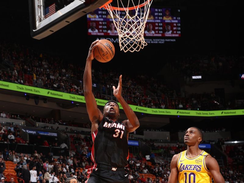 MIAMI, FL - DECEMBER 4: Thomas Bryant #31 of the Miami Heat drives to the basket during the game against the Los Angeles Lakers on December 4, 2024 at Kaseya Center in Miami, Florida. NOTE TO USER: User expressly acknowledges and agrees that, by downloading and or using this Photograph, user is consenting to the terms and conditions of the Getty Images License Agreement. Mandatory Copyright Notice: Copyright 2024 NBAE (Photo by Joe Murphy/NBAE via Getty Images)