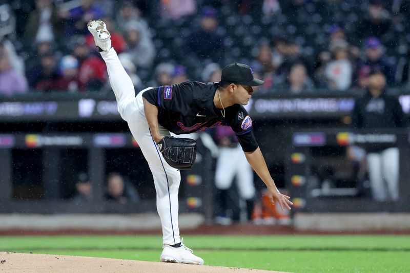 May 10, 2024; New York City, New York, USA; New York Mets starting pitcher Jose Quintana (62) follows through on a pitch against the Atlanta Braves during the first inning at Citi Field. Mandatory Credit: Brad Penner-USA TODAY Sports