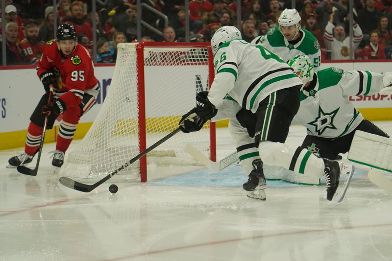 Nov 27, 2024; Chicago, Illinois, USA; Dallas Stars defenseman Ilya Lyubushkin (46) and Chicago Blackhawks right wing Ilya Mikheyev (95) go for the puck during the first period at United Center. Mandatory Credit: David Banks-Imagn Images