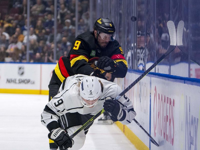 Mar 25, 2024; Vancouver, British Columbia, CAN;  Vancouver Canucks forward J.T. Miller (9) checks Los Angeles Kings forward Adrian Kempe (9) in the first period at Rogers Arena. Mandatory Credit: Bob Frid-USA TODAY Sports