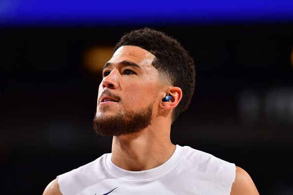 PHOENIX, AZ - NOVEMBER 2: Devin Booker #1 of the Phoenix Suns looks on before the game against the San Antonio Spurs on November 2, 2023 at Footprint Center in Phoenix, Arizona. NOTE TO USER: User expressly acknowledges and agrees that, by downloading and or using this photograph, user is consenting to the terms and conditions of the Getty Images License Agreement. Mandatory Copyright Notice: Copyright 2023 NBAE (Photo by Barry Gossage/NBAE via Getty Images)