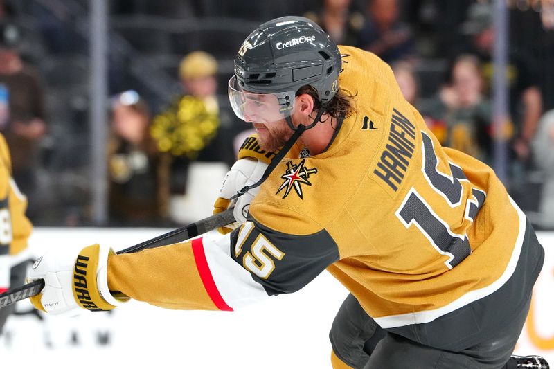 Oct 11, 2024; Las Vegas, Nevada, USA; Vegas Golden Knights defenseman Noah Hanifin (15) warms up before a game against the St. Louis Blues at T-Mobile Arena. Mandatory Credit: Stephen R. Sylvanie-Imagn Images