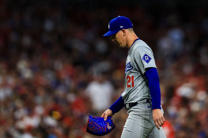 May 25, 2024; Cincinnati, Ohio, USA; Los Angeles Dodgers starting pitcher Walker Buehler (21) walks off the field during a pitching change in the sixth inning against the Cincinnati Reds at Great American Ball Park. Mandatory Credit: Katie Stratman-USA TODAY Sports