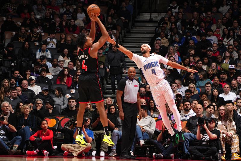 TORONTO, CANADA - JANUARY 3: Scottie Barnes #4 of the Toronto Raptors shoots the ball during the game against the Orlando Magic on January 3, 2025 at the Scotiabank Arena in Toronto, Ontario, Canada.  NOTE TO USER: User expressly acknowledges and agrees that, by downloading and or using this Photograph, user is consenting to the terms and conditions of the Getty Images License Agreement.  Mandatory Copyright Notice: Copyright 2025 NBAE(Photo by Mark Blinch/NBAE via Getty Images)