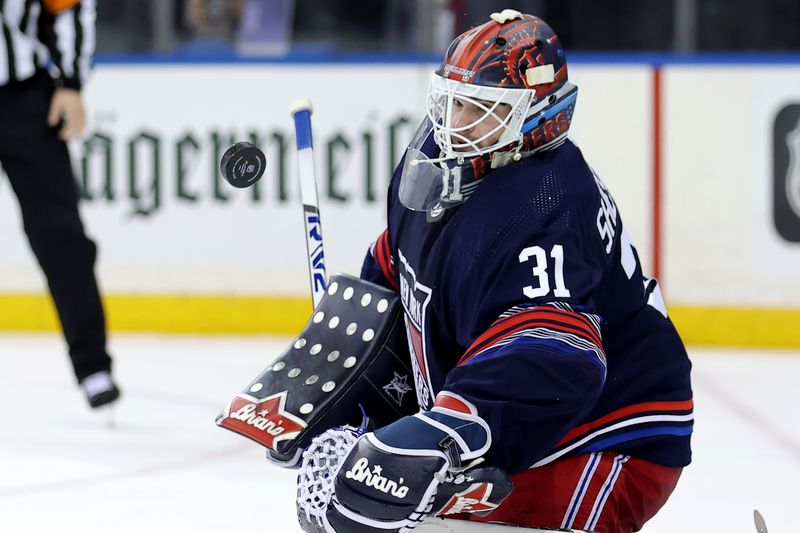 Jan 14, 2024; New York, New York, USA; New York Rangers goaltender Igor Shesterkin (31) makes a save against the Washington Capitals during the third period at Madison Square Garden. Mandatory Credit: Brad Penner-USA TODAY Sports