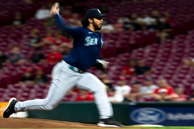 Sep 6, 2023; Cincinnati, Ohio, USA; Seattle Mariners relief pitcher Andres Munoz (75) delivers a pitch in the ninth inning of the MLB baseball game between the Cincinnati Reds and the Seattle Mariners at Great American Ball Park. Mandatory Credit: Albert Cesare-USA TODAY Sports