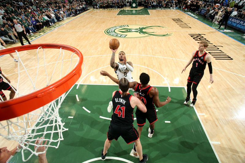 MILWAUKEE, WI - APRIL 5: Damian Lillard #0 of the Milwaukee Bucks shoots the ball during the game against the Toronto Raptors on April 5, 2024 at the Fiserv Forum Center in Milwaukee, Wisconsin. NOTE TO USER: User expressly acknowledges and agrees that, by downloading and or using this Photograph, user is consenting to the terms and conditions of the Getty Images License Agreement. Mandatory Copyright Notice: Copyright 2024 NBAE (Photo by Gary Dineen/NBAE via Getty Images).