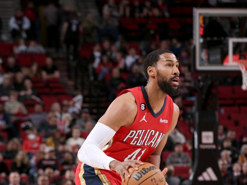 PORTLAND, OR - MARCH 27:  Garrett Temple #41 of the New Orleans Pelicans handles the ball against the Portland Trail Blazers on March 27, 2023 at the Moda Center Arena in Portland, Oregon. NOTE TO USER: User expressly acknowledges and agrees that, by downloading and or using this photograph, user is consenting to the terms and conditions of the Getty Images License Agreement. Mandatory Copyright Notice: Copyright 2023 NBAE (Photo by Cameron Browne/NBAE via Getty Images)