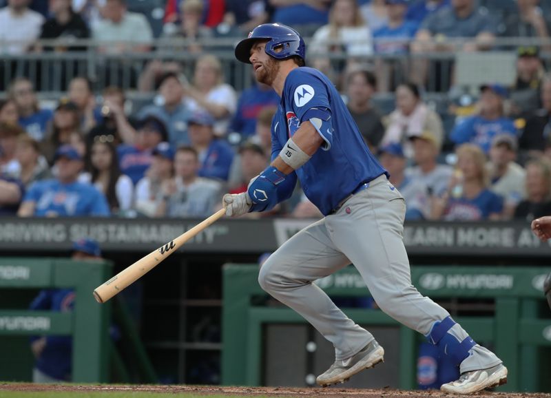 Apr 30, 2025; Pittsburgh, Pennsylvania, USA;  Chicago Cubs right fielder Kyle Tucker (30) hits a single against the Pittsburgh Pirates during the fourth inning at PNC Park. Mandatory Credit: Charles LeClaire-Imagn Images