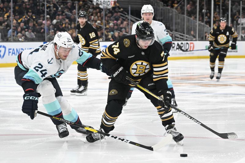 Feb 15, 2024; Boston, Massachusetts, USA; Boston Bruins left-wing Jake DeBrusk (74) and Seattle Kraken defenseman Jamie Oleksiak (24) battle for the puck during the third period at the TD Garden. Mandatory Credit: Brian Fluharty-USA TODAY Sports