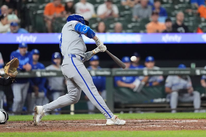 May 3, 2025; Baltimore, Maryland, USA; Kansas City Royals center fielder Kyle Isbel (28) hits a home run against the Baltimore Orioles during the eighth inning at Oriole Park at Camden Yards. Mandatory Credit: Gregory Fisher-Imagn Images