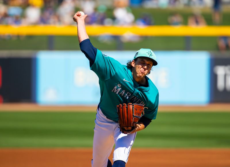 Mar 5, 2024; Peoria, Arizona, USA; Seattle Mariners pitcher Logan Gilbert against the Texas Rangers during a spring training baseball game at Peoria Sports Complex. Mandatory Credit: Mark J. Rebilas-USA TODAY Sports