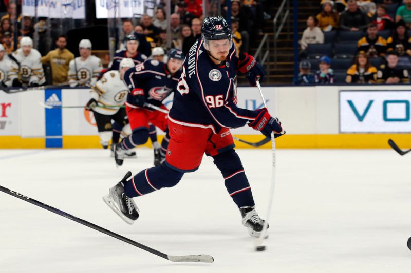 Jan 2, 2024; Columbus, Ohio, USA; Columbus Blue Jackets center Jack Roslovic (96) wrists a shot on goal against the Boston Bruins during the third period at Nationwide Arena. Mandatory Credit: Russell LaBounty-USA TODAY Sports