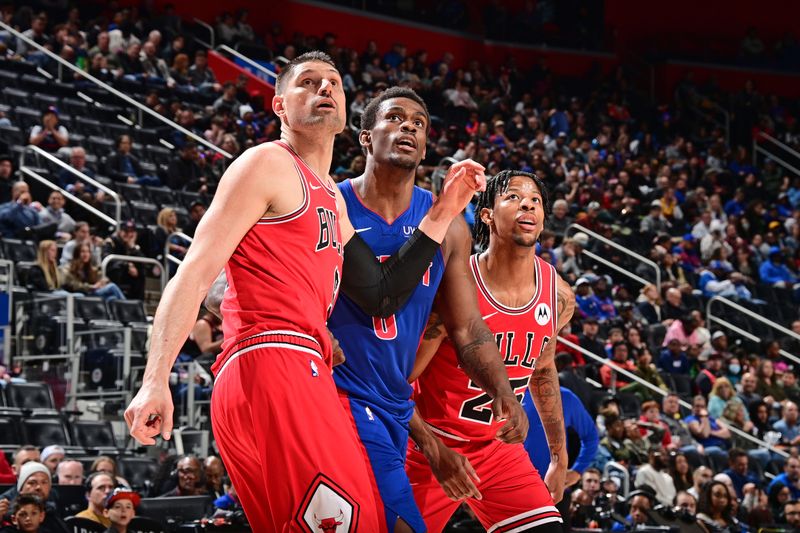 DETROIT, MI - APRIL 11: Nikola Vucevic #9 of the Chicago Bulls boxes out during the game against the Detroit Pistons on April 11, 2024 at Little Caesars Arena in Detroit, Michigan. NOTE TO USER: User expressly acknowledges and agrees that, by downloading and/or using this photograph, User is consenting to the terms and conditions of the Getty Images License Agreement. Mandatory Copyright Notice: Copyright 2024 NBAE (Photo by Chris Schwegler/NBAE via Getty Images)