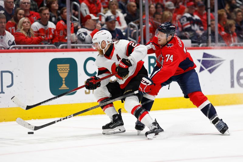 Feb 26, 2024; Washington, District of Columbia, USA; Ottawa Senators right wing Claude Giroux (28) skates with the puck as Washington Capitals defenseman John Carlson (74) defends in the second period at Capital One Arena. Mandatory Credit: Geoff Burke-USA TODAY Sports