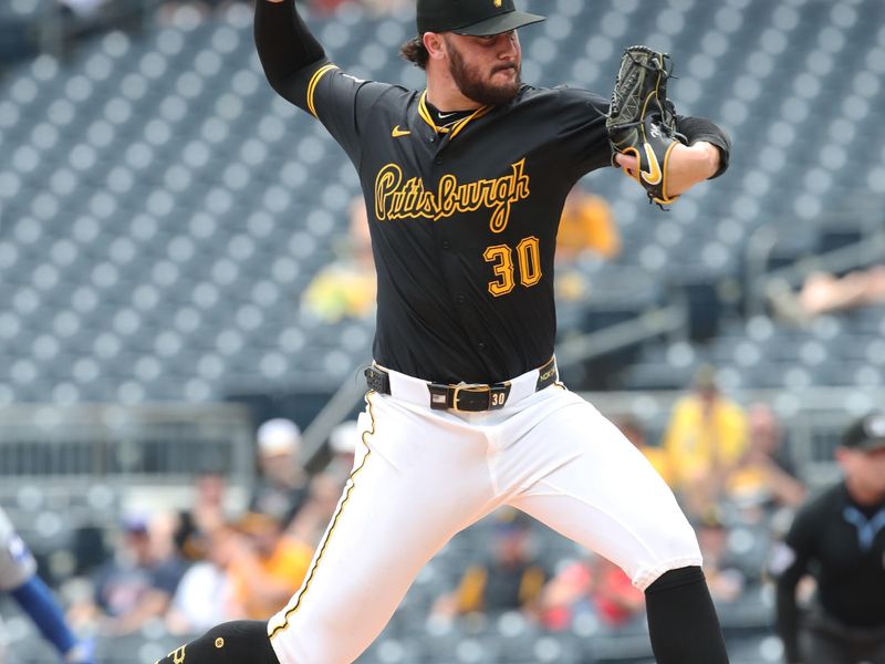 May 1, 2025; Pittsburgh, Pennsylvania, USA;  Pittsburgh Pirates starting pitcher Paul Skenes (30) pitches against the Chicago Cubs during the second inning at PNC Park. Mandatory Credit: Charles LeClaire-Imagn Images