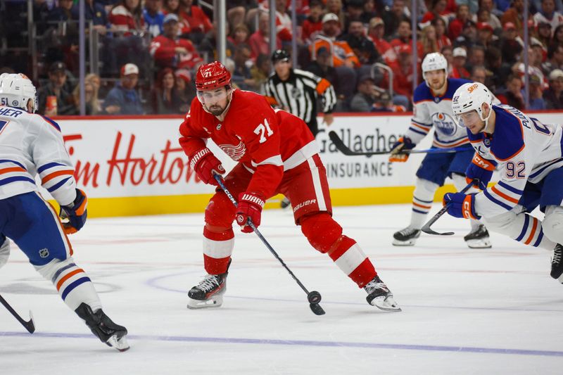 Oct 27, 2024; Detroit, Michigan, USA; Detroit Red Wings center Dylan Larkin (71) handles the puck during the second period of the game against the Edmonton Oilers at Little Caesars Arena. Mandatory Credit: Brian Bradshaw Sevald-Imagn Images