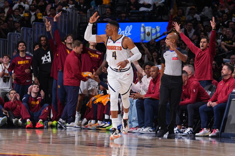 DENVER, CO - OCTOBER 13: Russell Westbrook #4 of the Denver Nuggets celebrates during the game against the Phoenix Suns on October 13, 2024 at Ball Arena in Denver, Colorado. NOTE TO USER: User expressly acknowledges and agrees that, by downloading and/or using this Photograph, user is consenting to the terms and conditions of the Getty Images License Agreement. Mandatory Copyright Notice: Copyright 2024 NBAE (Photo by Bart Young/NBAE via Getty Images)