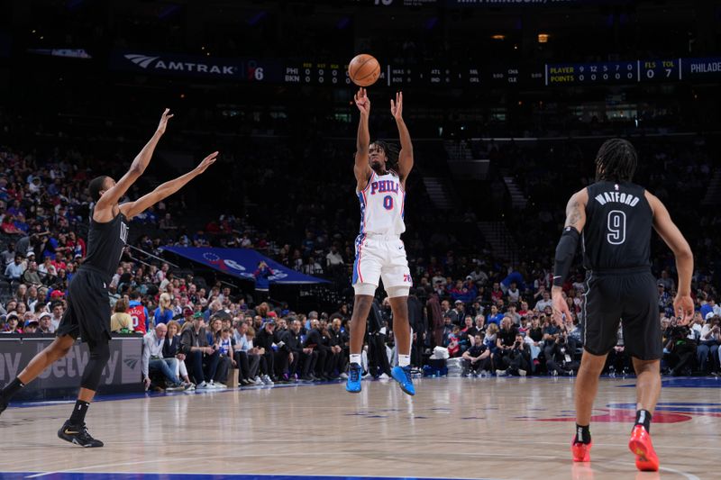 PHILADELPHIA, PA - APRIL 14: Tyrese Maxey #0 of the Philadelphia 76ers shoots the ball during the game against the Brooklyn Nets on April 14, 2024 at the Wells Fargo Center in Philadelphia, Pennsylvania NOTE TO USER: User expressly acknowledges and agrees that, by downloading and/or using this Photograph, user is consenting to the terms and conditions of the Getty Images License Agreement. Mandatory Copyright Notice: Copyright 2024 NBAE (Photo by Jesse D. Garrabrant/NBAE via Getty Images)