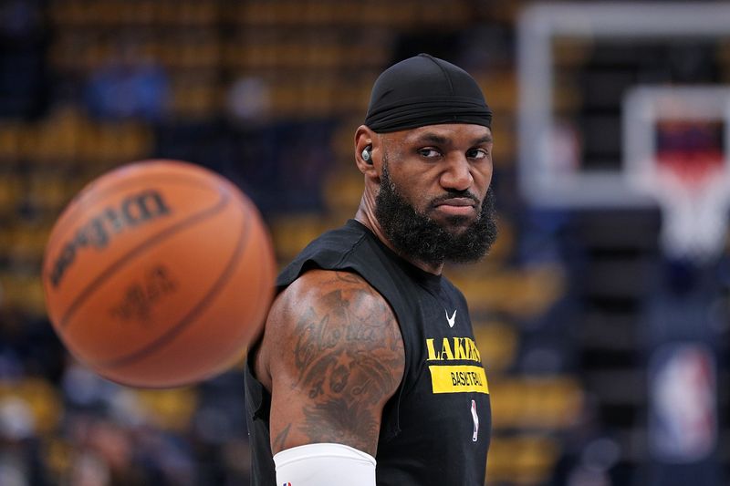 MEMPHIS, TENNESSEE - APRIL 16: LeBron James #6 of the Los Angeles Lakers warms up before Game One of the Western Conference First Round Playoffs against the Memphis Grizzlies at FedExForum on April 16, 2023 in Memphis, Tennessee. NOTE TO USER: User expressly acknowledges and agrees that, by downloading and or using this photograph, User is consenting to the terms and conditions of the Getty Images License Agreement.  (Photo by Justin Ford/Getty Images)