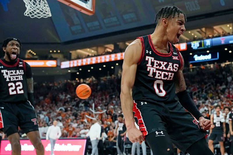 Jan 6, 2024; Austin, Texas, USA; Texas Tech Red Raiders guard Chance McMillian (0) and forward Warren Washington (22) react after McMillian dunked during the second half at Moody Center. Mandatory Credit: Scott Wachter-USA TODAY Sports