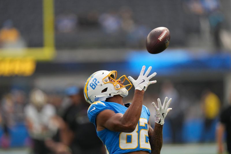 Los Angeles Chargers wide receiver Brenden Rice (82) warms up before an NFL football game against the New Orleans Saints in Inglewood, Calif., Sunday, Oct. 27, 2024. (AP Photo/Mark J. Terrill)