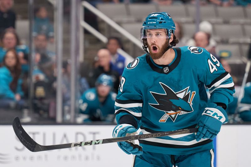 Jan 25, 2025; San Jose, California, USA; San Jose Sharks right wing Scott Sabourin (49) reacts against the Florida Panthers during the third period at SAP Center at San Jose. Mandatory Credit: Robert Edwards-Imagn Images