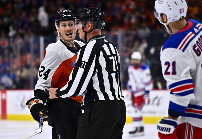 Feb 24, 2024; Philadelphia, Pennsylvania, USA; Philadelphia Flyers defenseman Nick Seeler (24) reacts against New York Rangers center Barclay Goodrow (21) in the second period at Wells Fargo Center. Mandatory Credit: Kyle Ross-USA TODAY Sports