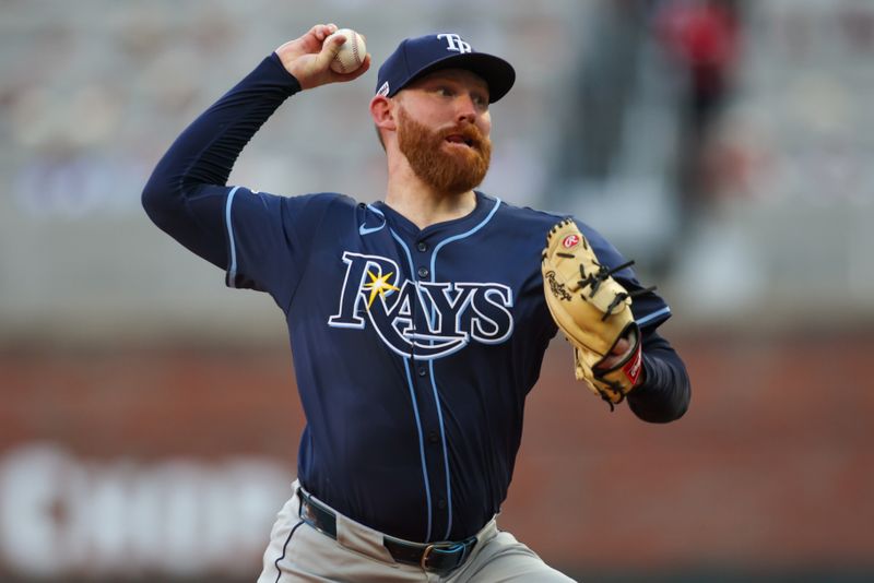 Jun 14, 2024; Atlanta, Georgia, USA; Tampa Bay Rays starting pitcher Zack Littell (52) throws against the Atlanta Braves in the second inning at Truist Park. Mandatory Credit: Brett Davis-USA TODAY Sports