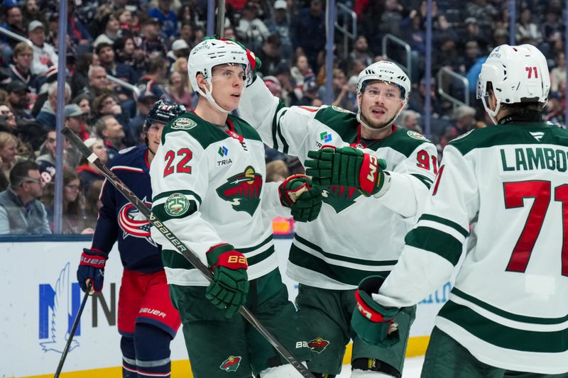 Dec 18, 2025; Columbus, Ohio, USA;  Minnesota Wild right wing Vladimir Tarasenko (91) celebrates with teammates after scoring a goal against Columbus Blue Jackets in the second period at Nationwide Arena. Mandatory Credit: Aaron Doster-Imagn Images
